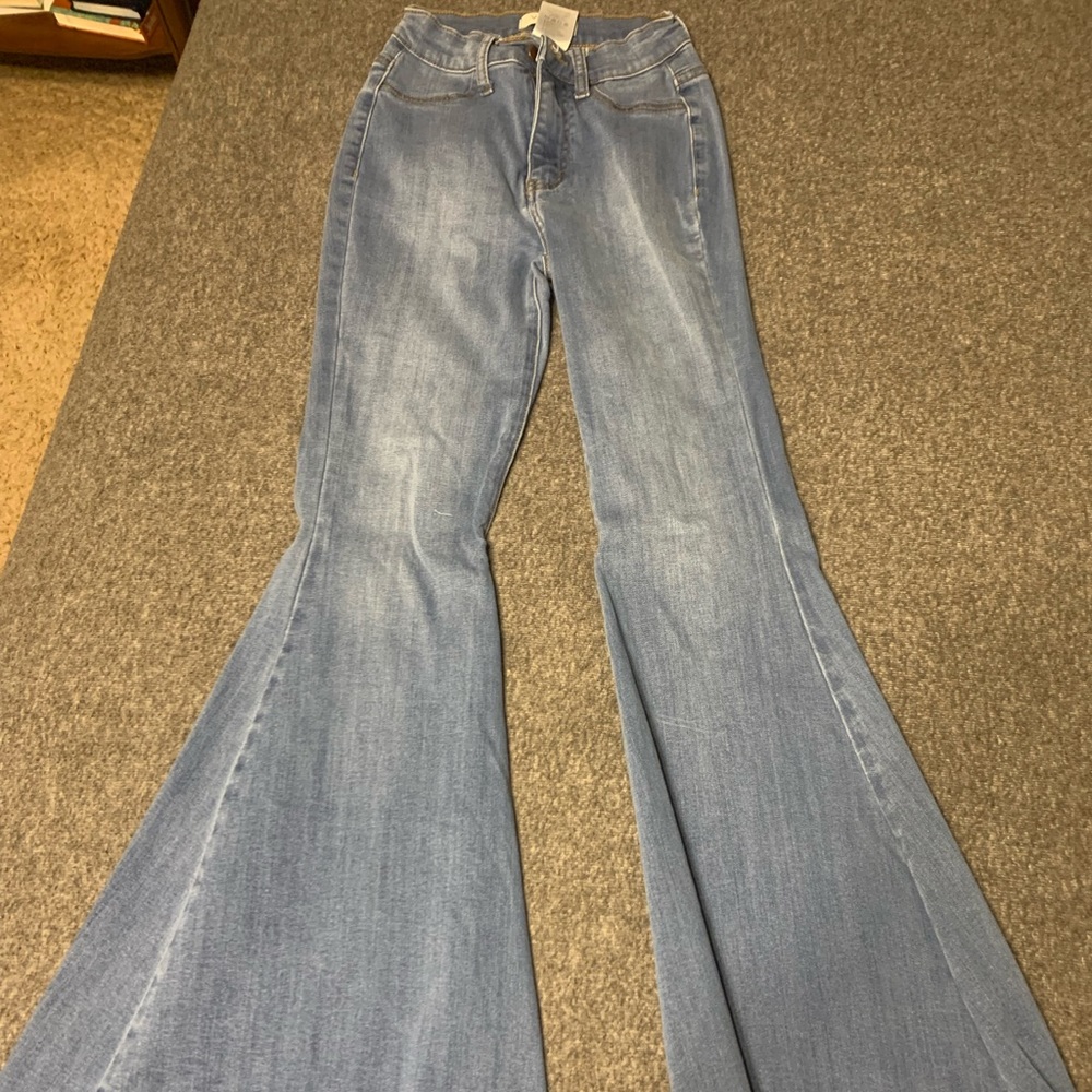 Bell bottom jeans with frayed edges